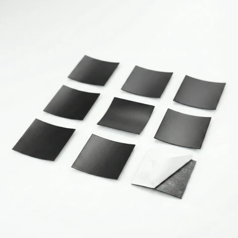 Square magnetic stickers 40 mm - 100 pcs - Graphic design. Nine black, slightly rounded squares on white.