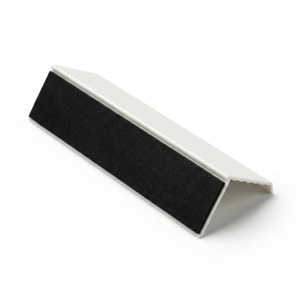 Magnetic marker shelf with a graphic design. Simple rectangular shape in ivory with a black base.
