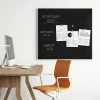 Magnetic chalkboard in an aluminum frame, available in any size - Office setup with light-colored walls.