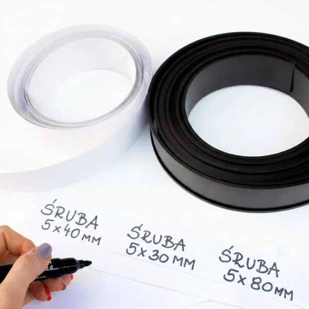 Magnetic tape for shelf marking, 5 m - Graphic design. Three black tape rolls visible on a white background.