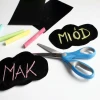 Custom chalkboard - Graphic design with two speech bubbles, scissors, and pastel-colored chalks.