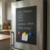 Chalk magnet for the fridge - Kitchen arrangement with light furniture and smooth beige walls.