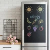 Custom chalkboard sticker for fridge - Kitchen decor with light walls, wooden accents, and plants.