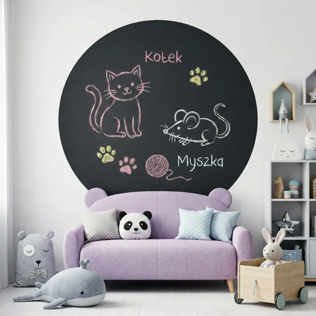Round chalkboard for kids\' room decor. Light-colored walls and animal-shaped furniture.