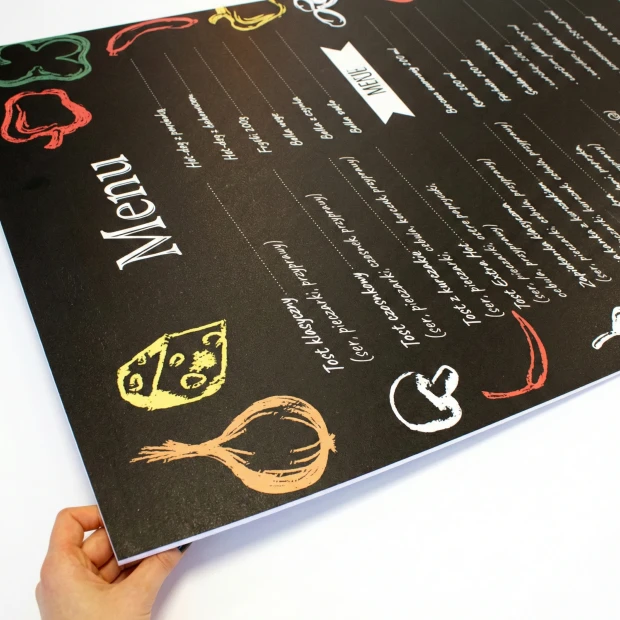 Custom chalkboard with graphic design. Dark background featuring colorful food drawings and text.