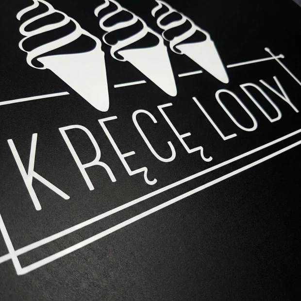 Custom chalkboard with graphic design. White letters on a black background.