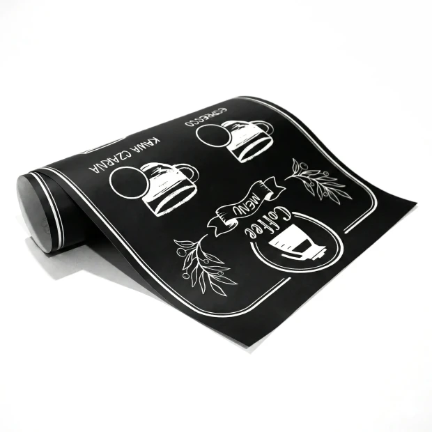 Custom chalkboard with graphic design featuring coffee cups and hand-drawn text.