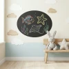 Round chalkboard for kids\' room decor. Bright walls and pastel furniture create a cheerful atmosphere.