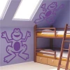 Charming frog sticker 1362 for a child\'s room, adding joy and color to the sloped space.