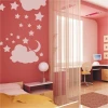 Charming star and cloud painting template in a pastel bedroom, adding magic and charm for kids.