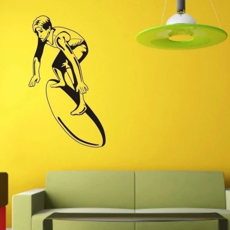 Dynamic surfer sticker 1328 brightens a yellow wall in a modern living room, adding a holiday vibe.