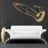Stylish surfer sticker 1334 in gold, perfect for a modern living room, adding a vibrant touch.