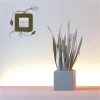 Sticker for outlet 1088 in a modern interior, adding subtle charm with plant accents.