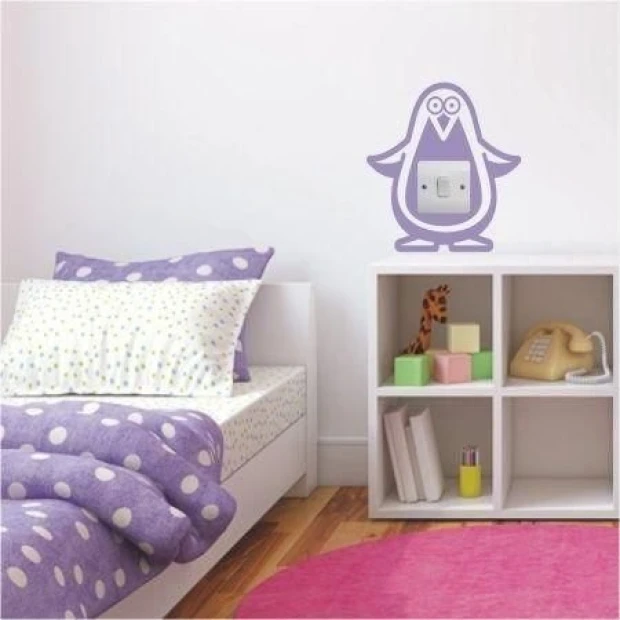 Charming penguin-shaped wall sticker, perfect for a child\'s room, adding a cheerful touch.
