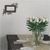 Elegant outlet sticker 1112 with a subtle leaf design, perfect for a modern dining room.