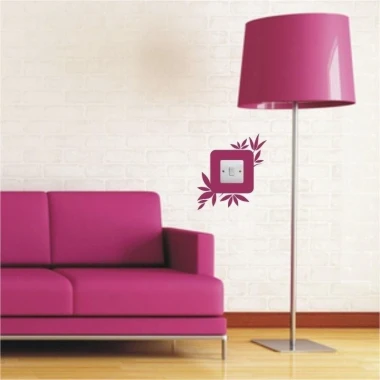 Sticker under the outlet 1080 in a modern living room with a pink sofa and lamp, adds a stylish touch.