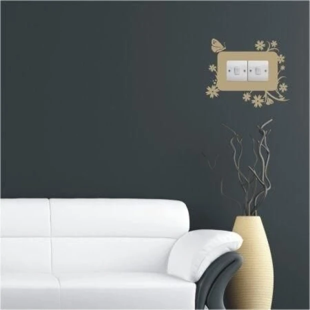 Painting template contact 1114 - Living room arrangement. Dark wall, light sofa, and decorative pattern around the outlet.