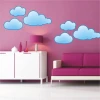 Cloud sticker 50 - Decor for a child\'s room. Pink walls with white and purple furniture.