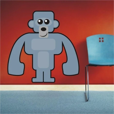 Charming gorilla sticker on a red wall, perfect for a modern children\'s room.