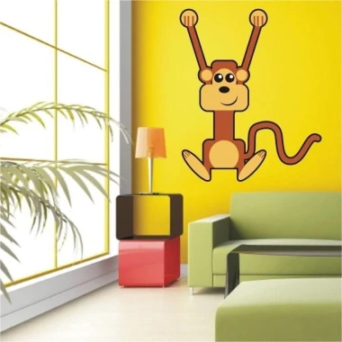 Cheerful monkey sticker in a colorful children\'s room, adding joy and energy to the space.