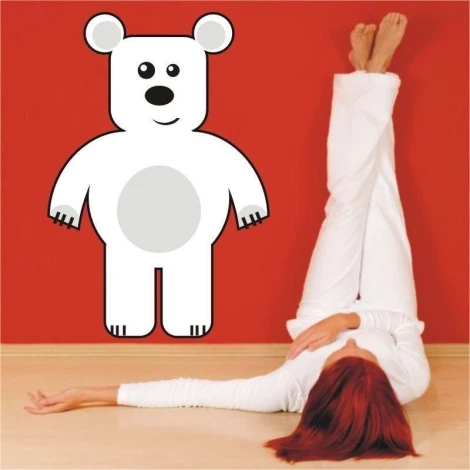 White bear sticker 25 cm, perfect for brightening up a child\'s room against a vibrant red background.
