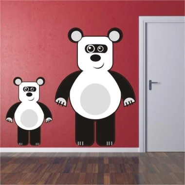 Charming panda sticker in a modern children\'s room, adding a cheerful touch to the wall.