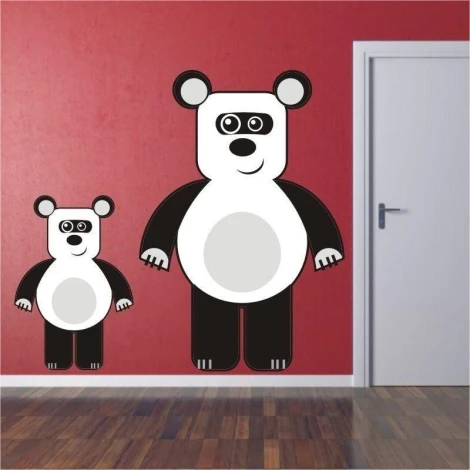 Charming panda sticker in a modern children\'s room, adding a cheerful touch to the wall.