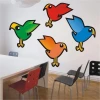 Colorful bird stickers in a modern dining room, adding cheerful energy and creativity to the space.