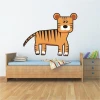 Tiger sticker in a cheerful children\'s style, perfect for a little explorer\'s room.