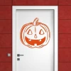 Cheerful orange pumpkin 1336 decorates doors in modern interiors, adding character and a Halloween touch.