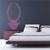 African sticker 1490 in a modern bedroom, adding an exotic touch and color to dark decor.