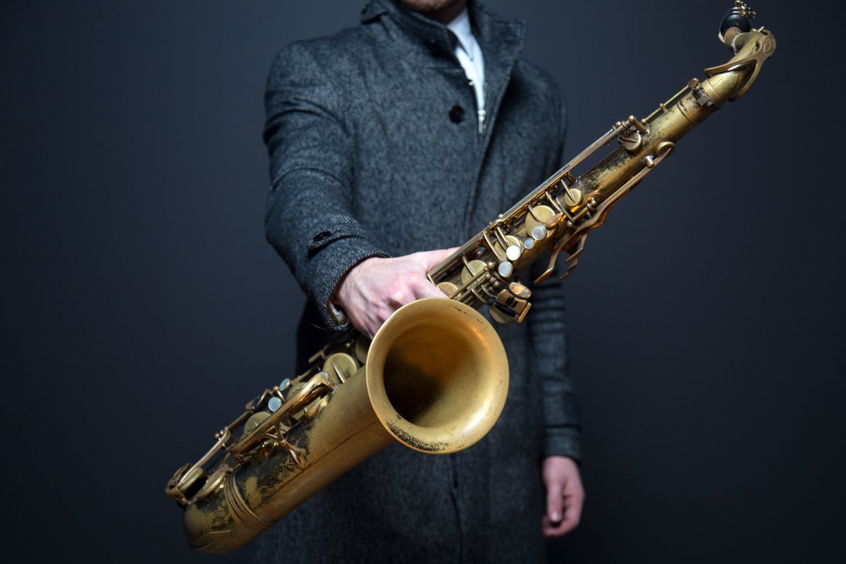 Sax golden tenor saxophone in black background by TONO BALAGUER. Photo  stock - StudioNow