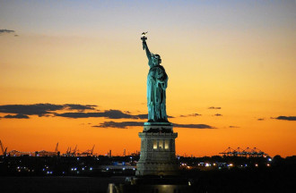 Wallpaper Statue Of Liberty On A Background Of Orange Sky Fp 5540