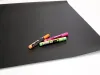 Self-adhesive magnetic board for chalk markers