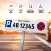 Parking sign with license plate number, private space