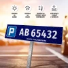 Parking sign with license plate number, reserved space